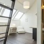 Opulent Coliving Space: Stylish communal living in this elegant Antwerp bedroom